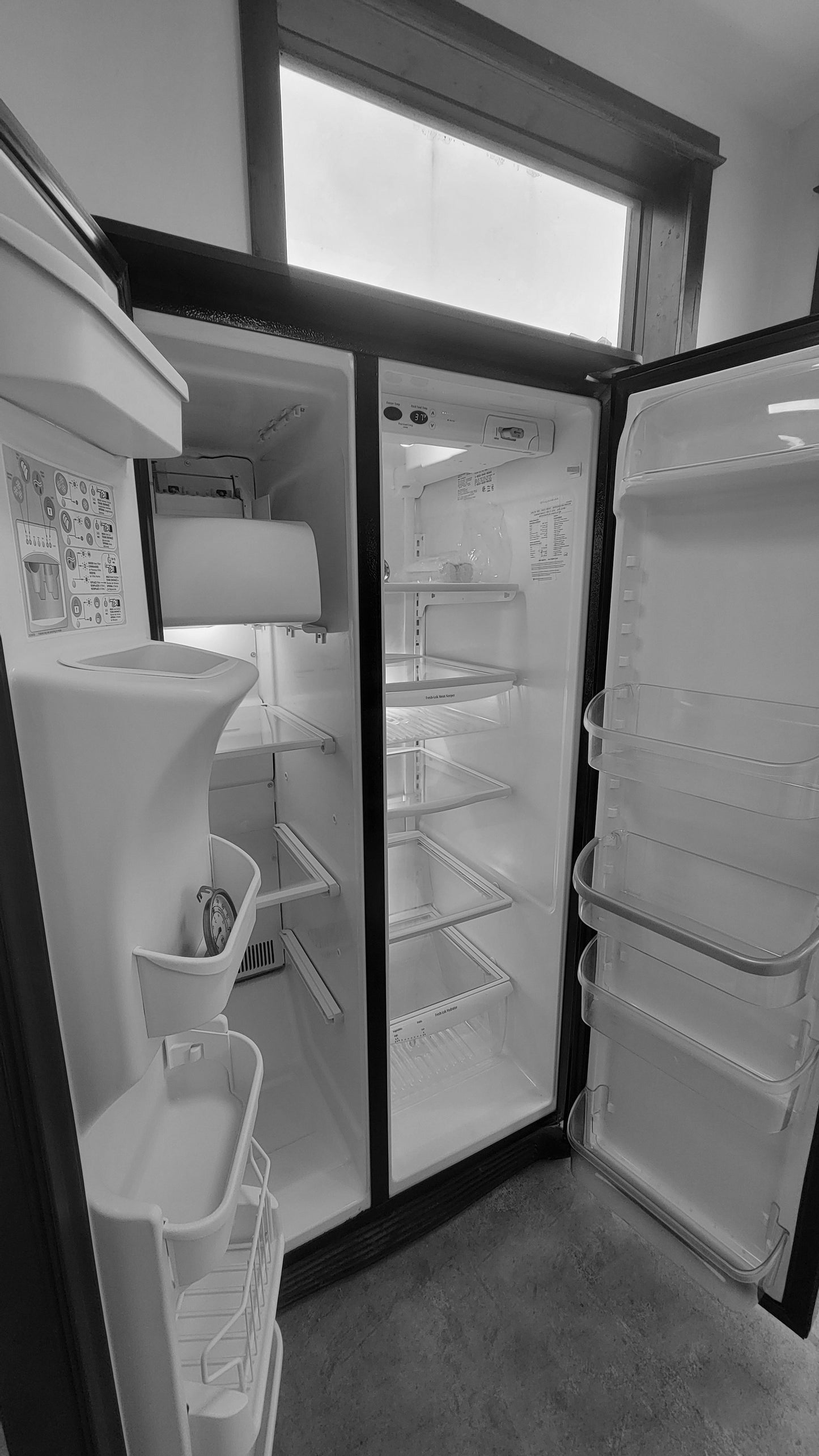 Used Reconditioned Frigidaire Black Side by Side Refrigerator