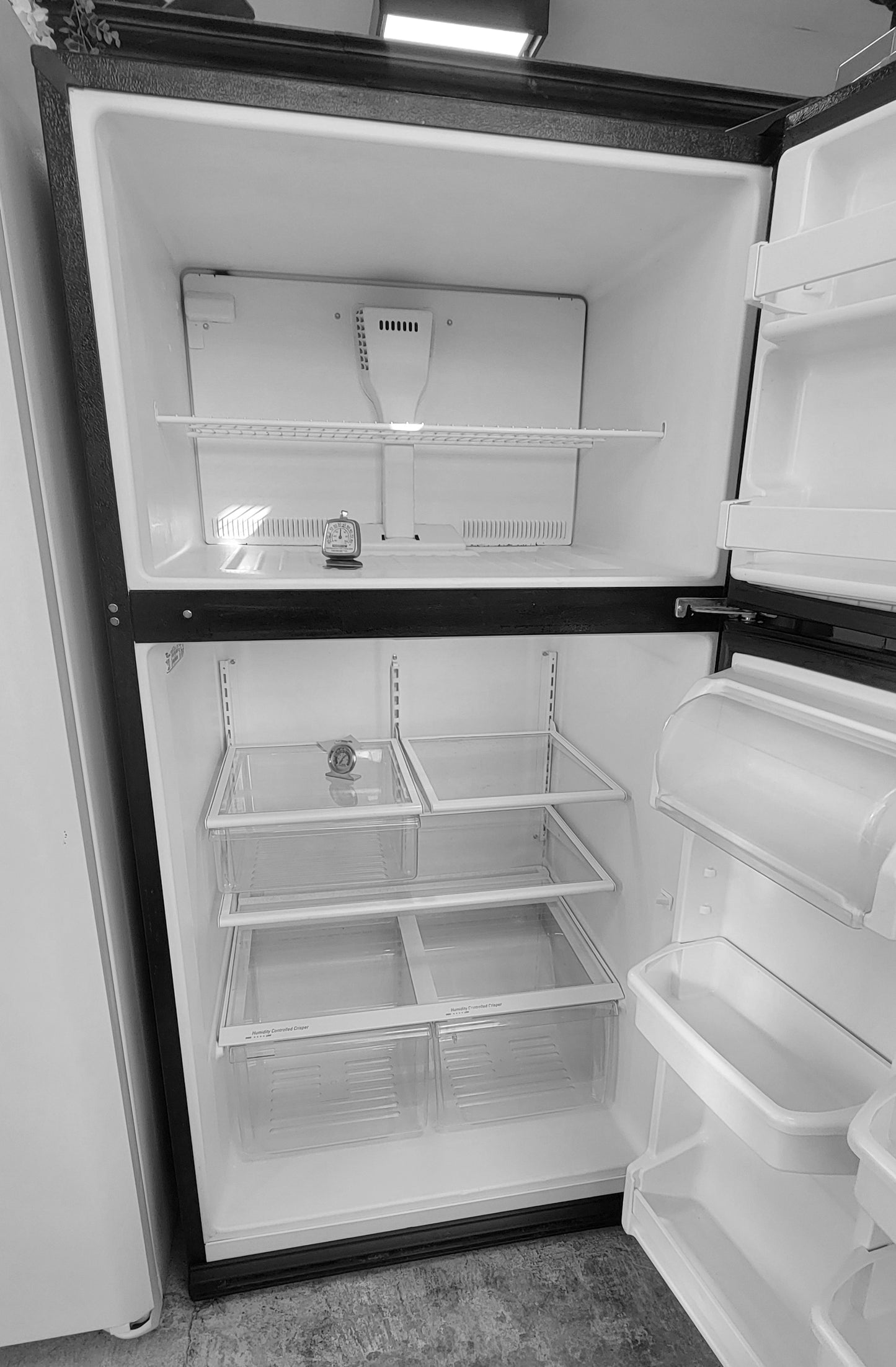 Used Reconditioned 21 Cu. Ft. Whirlpool Black Refrigerator