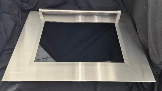 Used Genuine OEM Wolf range stainless steel oven door outer panel skin part 829068 measuring 29-7/8 by 22-1/4 inches.