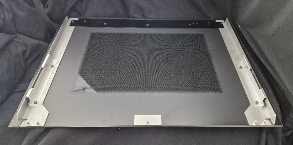 Used Genuine OEM Wolf range stainless steel oven door outer panel skin part 829068 measuring 29-7/8 by 22-1/4 inches 3