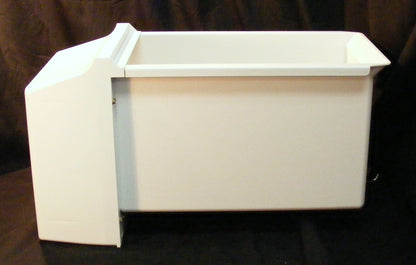 10312301 Ice dispenser holds the Ice in the freezer compartment