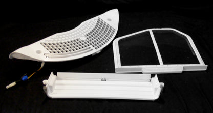 Used OEM Whirlpool dryer lint screen grill pack including lint screen housing, grill, flipper door, lint screen, wire harness, and moisture sensor bars.