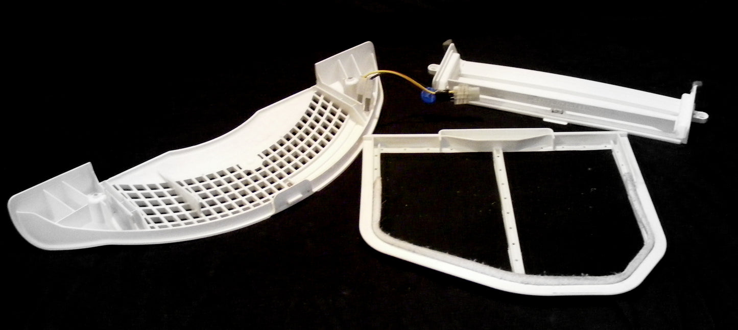 Used OEM Whirlpool dryer lint screen grill pack including lint screen housing, grill, flipper door, lint screen, wire harness, and moisture sensor bars. back